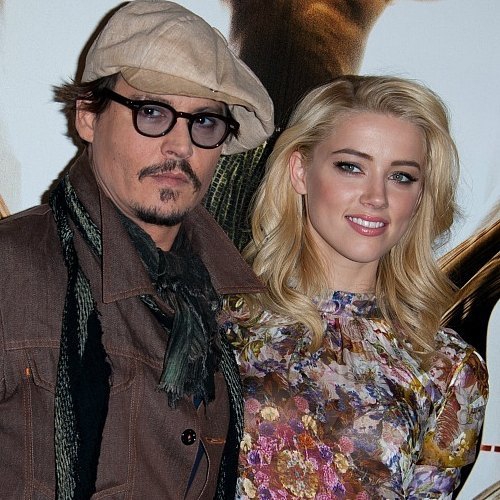 Amber Heard & Johnny Depp Selesaikan Perceraian Mereka